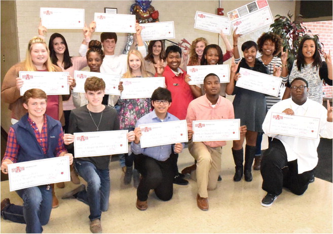 A-State officials make surprise scholarship presentations