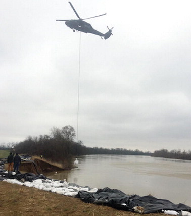 National Guard, work crews race against rising waters in northeast Arkansas