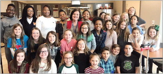 Students sing for Retired Teachers